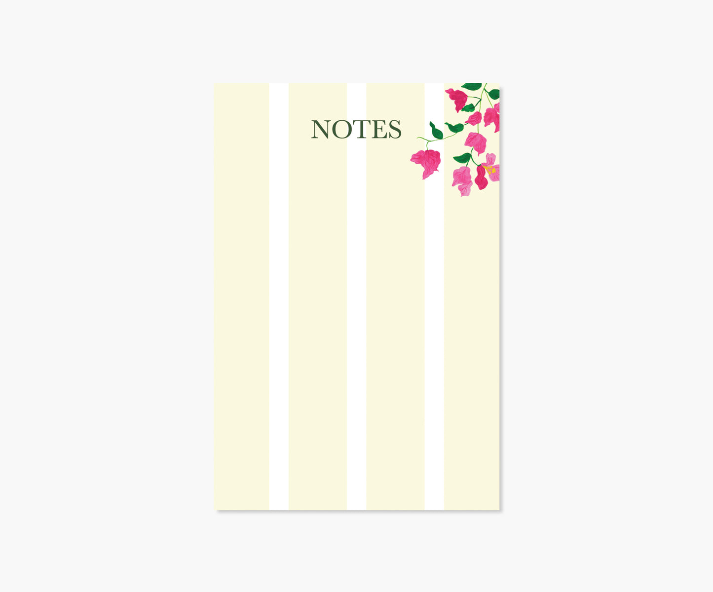 A beige notepad with a floral design and the word 'notes' written on the cover.